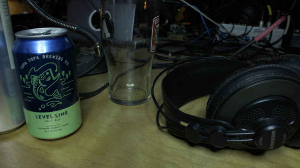 Image of Topa Topa Level Line IPA can and audio recording gear.